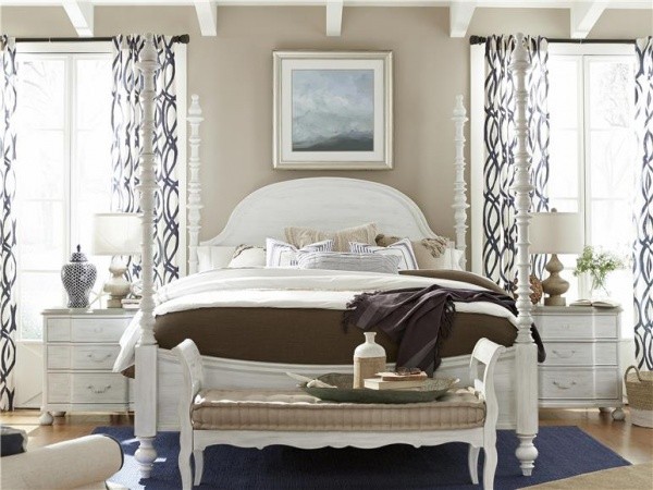 luxury home furniture master bedroom with white canopy bed and white and brown bedding with white nightstands