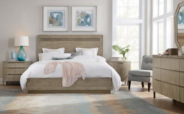 luxury home furniture bedroom with wood furniture and white bedding with light blue accents