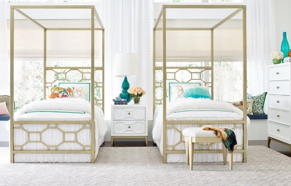 luxury finished interior bedroom with two white beds with wooden frames with white furtniture and multicolored accents