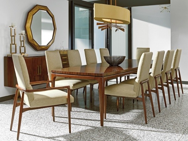 luxury dining room with wooden table and 10 wood and cream chairs