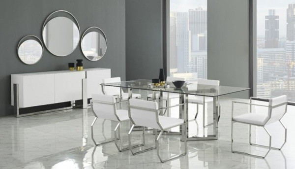 luxury dining room with modern metal and glass table with white and metal chairs