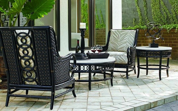 luxury patio including black and green colors with round black and white table and two black and green chairs