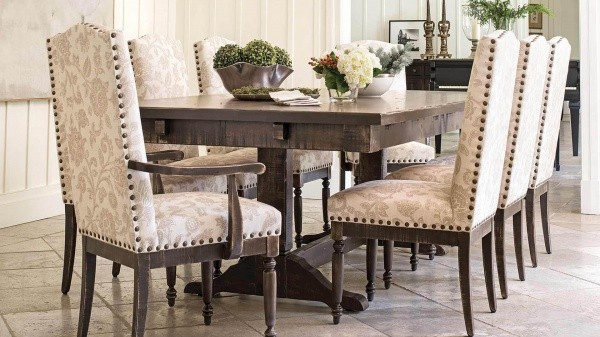 luxury dining room with eight seat dining room table with cream colored patterned dining room chairs