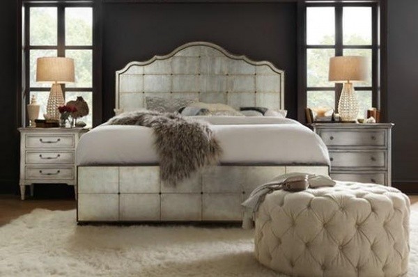 luxury home furniture master bedroom with king bed, dual nightstands and ottoman