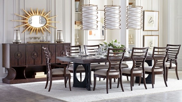 luxury dining room with long brown wooden table with eight wooden chairs with white seats