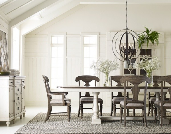 luxury dining room with white and grey color scheme with white table with grey and white chairs