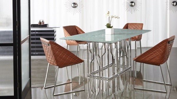 luxury dining room with modern metal table and modern triangular leather chairs
