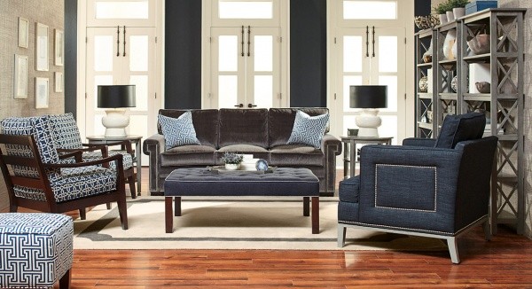 luxury living room featuring small sofa, multiple blue chairs, hardwood floor and a blue table
