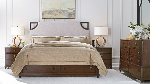 luxury home furniture master bedroom with brown color scheme with brown wood dresser, nightstands and bed frame