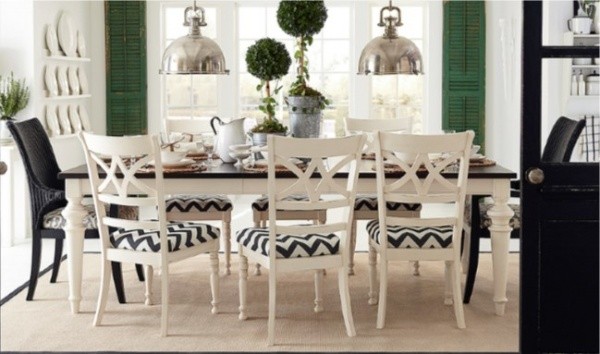 luxury dining room with black and white table and black and white chairs with zigzag pattern