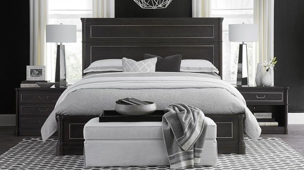 luxury home furniture master bedroom with white, black, and grey bed with black nightstands