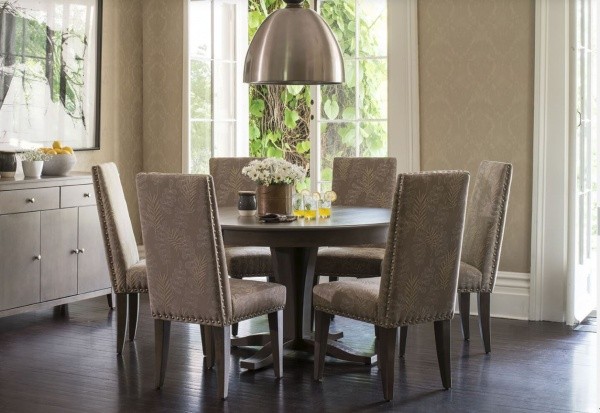 luxury dining room with round table and 6 chairs with floral patterns