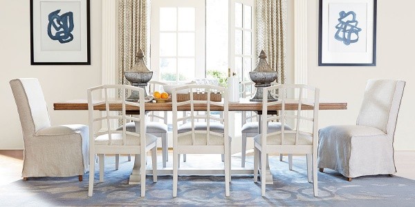 luxury dining room with white and brown wood table with eight white dining room tables