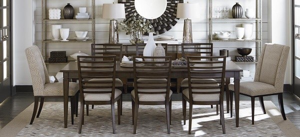 luxury dining room with brown wooden dining room table with cream colored accents and chairs
