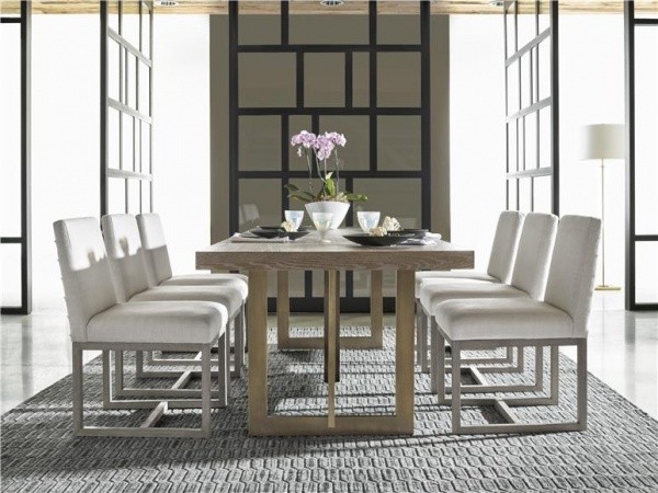 luxury dining room with wooden table and six white chairs