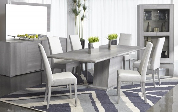 luxury dining room with grey wood table with grey leather chairs with grey furniture and accents