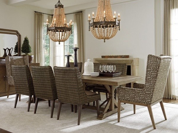 luxury dining room with wooden table with brown striped chairs