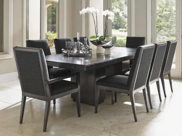luxury dining room with black dining room table with eight black chairs