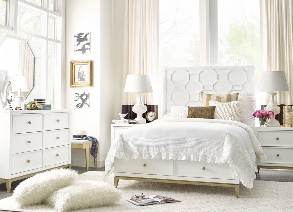 luxury finished interior bedroom with all white color scheme with white bed, white pillows, white furniture and white lamps