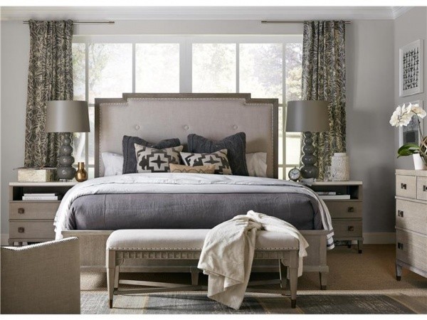 luxury home furniture master bedroom with grey tones color scheme with bed, grey nightstands and dresser